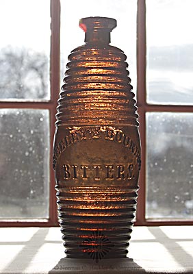 "Greeley's Bourbon / Bitters." Figural Bottle, R/H #G-101