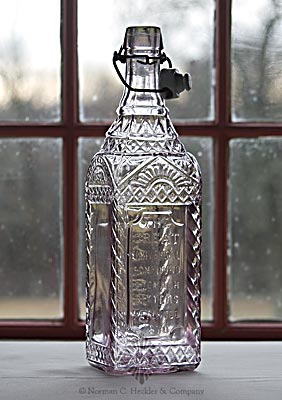 "The / Great / Universal / Compound / Stomach / Bitters / Patented / 1870" - "Professor / Geo. J. Byrne / New York" Figural Bitters Bottle, R/H #B-280