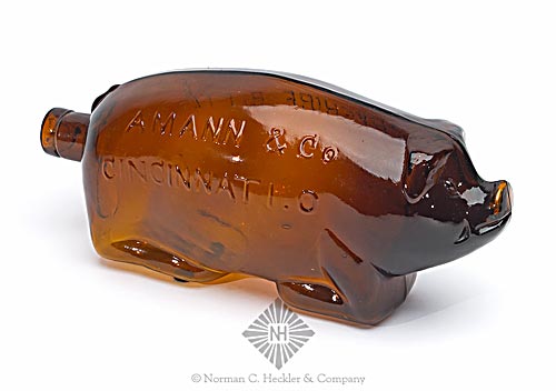 "Berkshire. Bitters" - "Amann & Co / Cincinnati. O" Figural Bitters Bottle, R/H #B-81.2