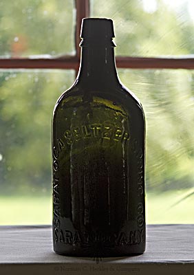 "Saratoga Seltzer Spring Co / (Spouting Spring) / Saratoga. N.Y." - "SSS" Mineral Water Bottle, T #S-50B