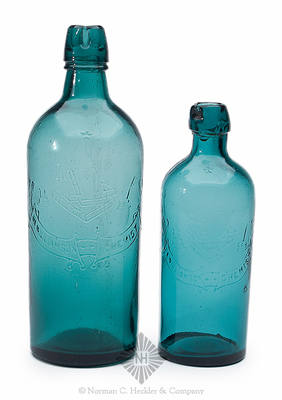 Two "(Star) / (Books And Inkwells) / J.A. Williamson Chemist" Master Ink Bottles, Similar to C #927