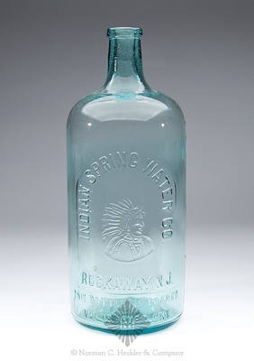 "Indian Spring Water Co. / (Bust Of Indian In Headdress) / Rockaway, N.J. / This Bottle Is Never Loaned / And Is Never Sold" Spring Water Bottle